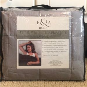 New in box 12 lb weighted blanket. 48” x 72”
